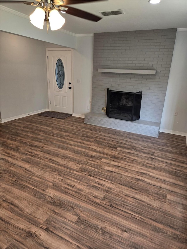 107 Malibu Dr, Shreveport, LA 71115 - unfurnished living room featuring crown molding, a ceiling fan, wood finished floors, and a fireplace