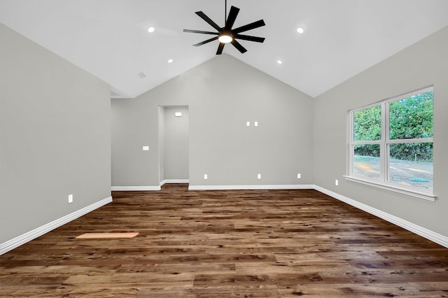 unfurnished living room featuring ceiling fan, dark hardwood / wood-style flooring, and high vaulted ceiling