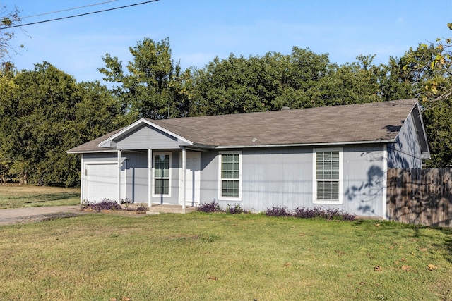 single story home featuring a front yard