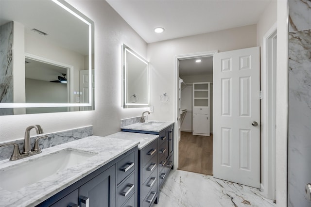 bathroom with vanity and ceiling fan