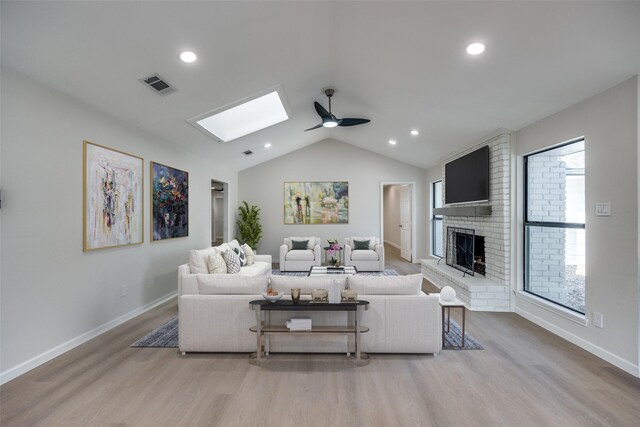 kitchen featuring lofted ceiling, hardwood / wood-style flooring, tasteful backsplash, and wall chimney exhaust hood