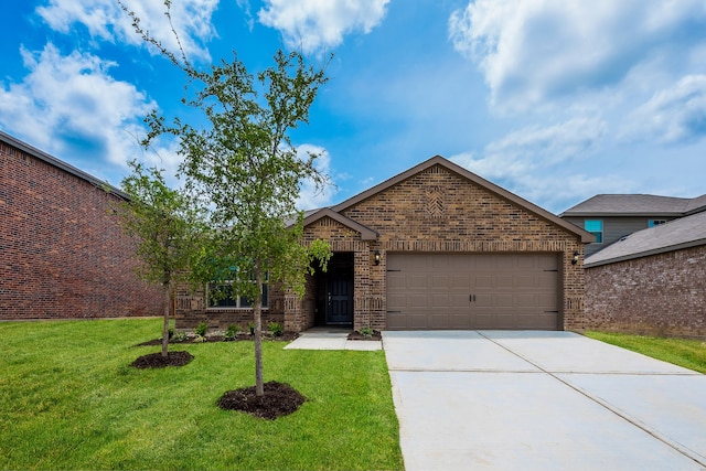 view of front of house with a front yard and a garage