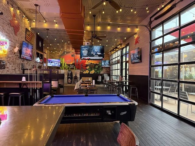 rec room featuring wood finished floors, an ornate ceiling, billiards, and a ceiling fan