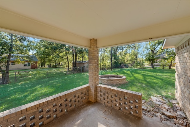 view of patio featuring an outdoor fire pit