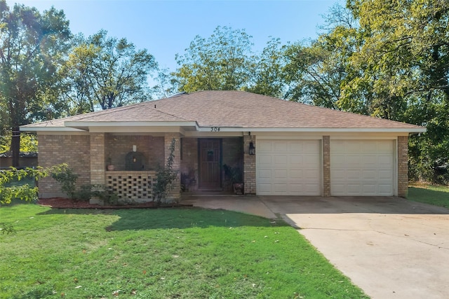 ranch-style home with a front lawn and a garage