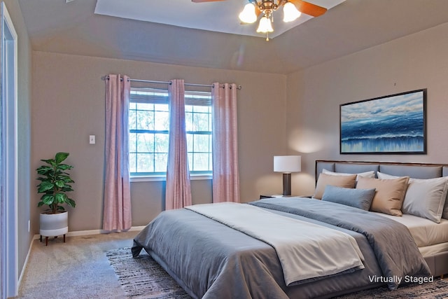 carpeted bedroom with ceiling fan