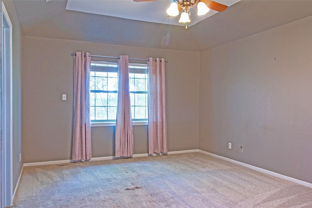 unfurnished room featuring light carpet and ceiling fan