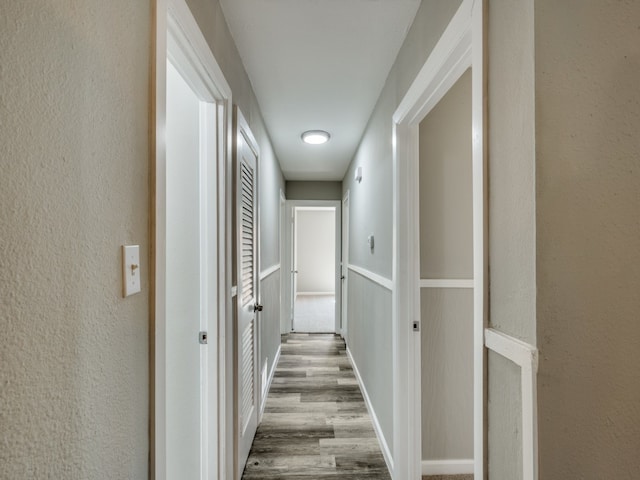 hall with light wood-type flooring