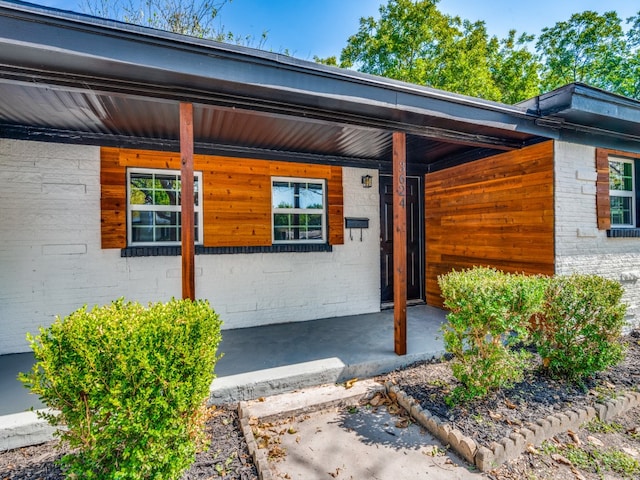 property entrance with a porch