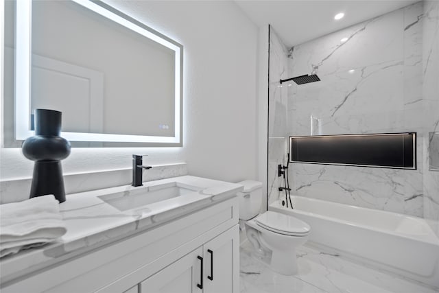 full bathroom featuring tiled shower / bath combo, vanity, and toilet