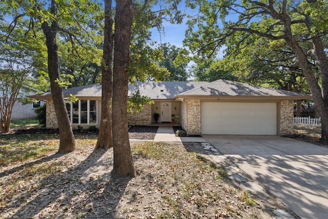 single story home featuring a garage