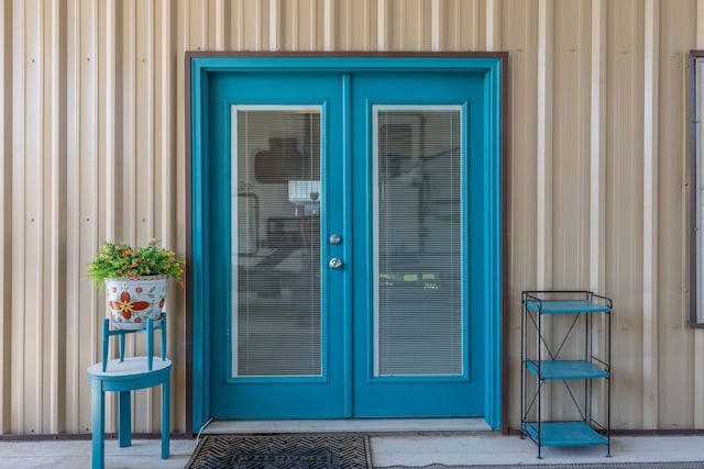 entrance to property featuring french doors