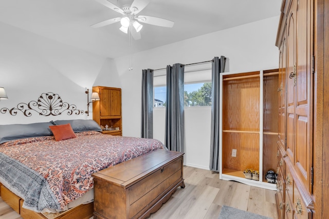 bedroom with light wood-type flooring and ceiling fan