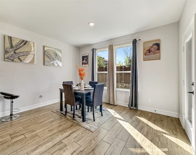 dining area featuring light hardwood / wood-style floors