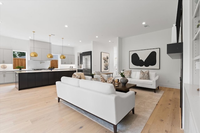 living room featuring light hardwood / wood-style flooring