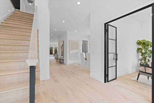 foyer featuring light wood-type flooring