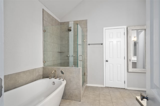 bathroom featuring shower with separate bathtub, high vaulted ceiling, and tile patterned flooring