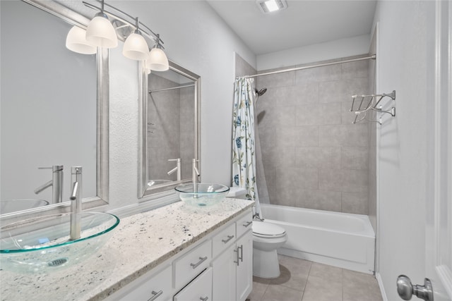 full bathroom featuring vanity, toilet, shower / bath combo, and tile patterned flooring