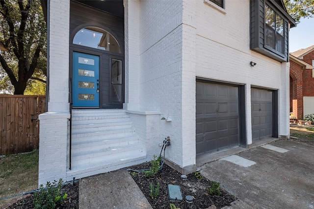 entrance to property with a garage