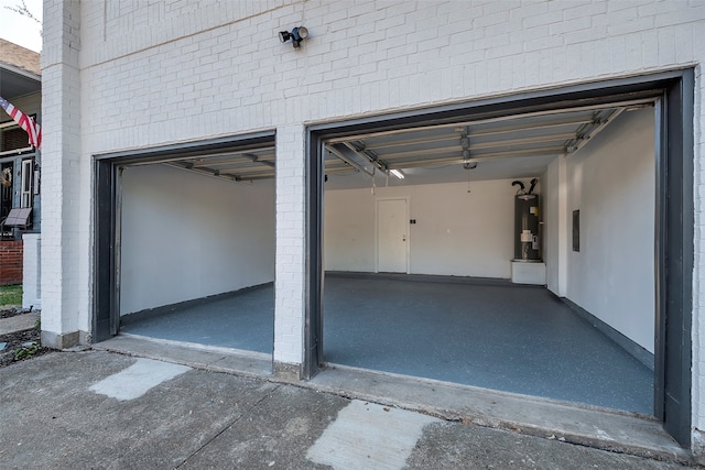 garage featuring water heater