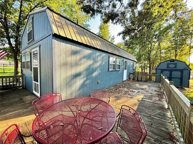 wooden deck with a storage unit