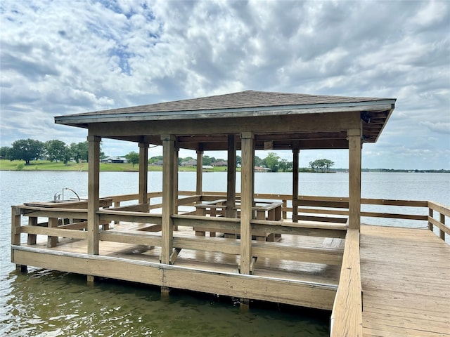 view of dock with a water view