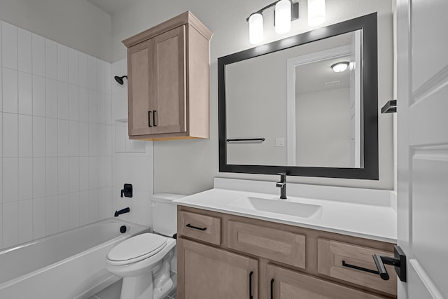 bathroom with toilet, vanity, and bathtub / shower combination