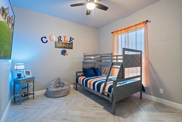 bedroom featuring parquet floors and ceiling fan