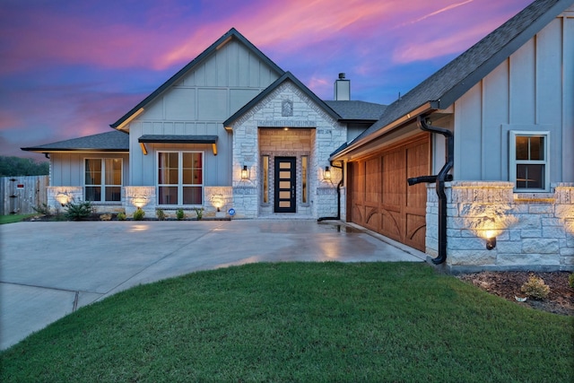 view of front of home with a lawn