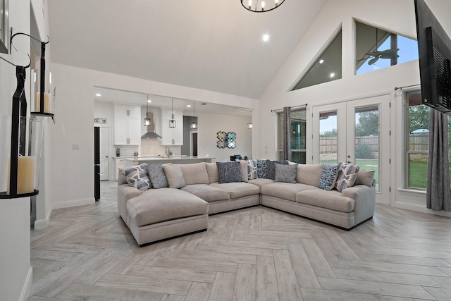 living room featuring french doors, high vaulted ceiling, and light parquet floors