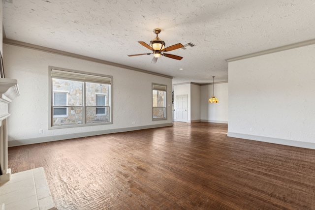 unfurnished living room with crown molding, ceiling fan, dark hardwood / wood-style floors, and a textured ceiling