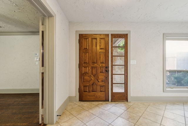 view of tiled foyer entrance