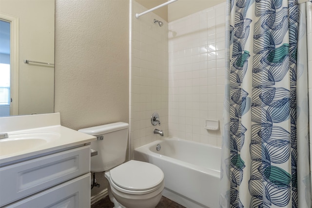 full bathroom featuring shower / bathtub combination with curtain, vanity, and toilet