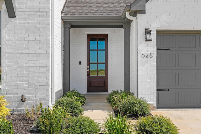 entrance to property with a garage