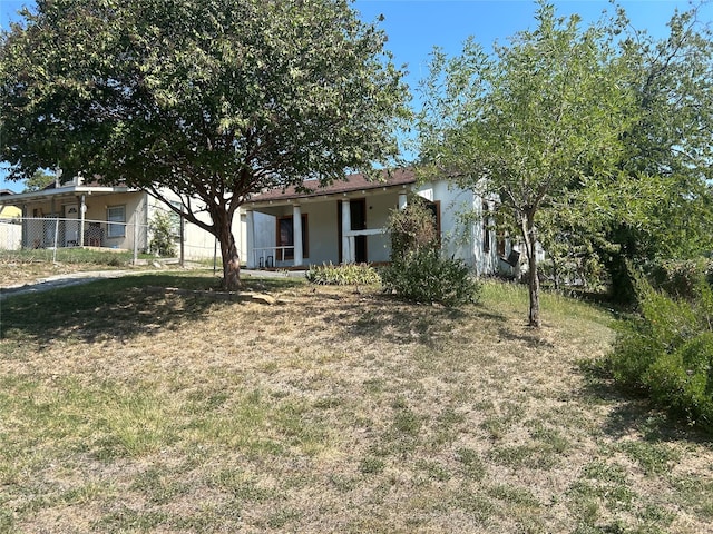 exterior space featuring a front lawn