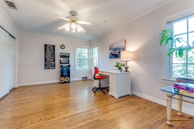 office with ceiling fan, light hardwood / wood-style floors, and ornamental molding