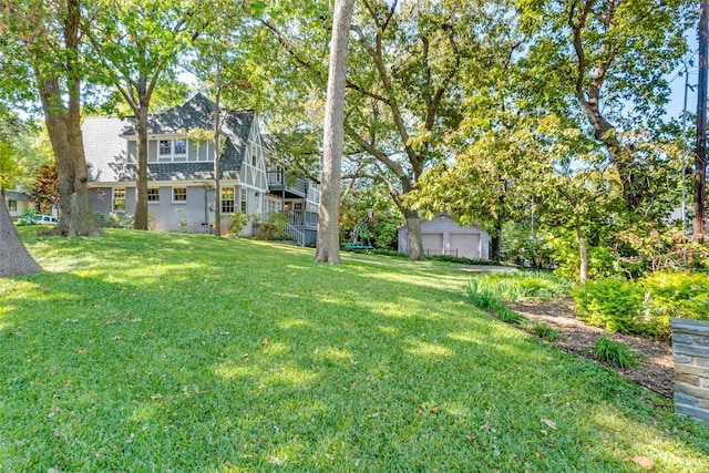 view of yard featuring a garage