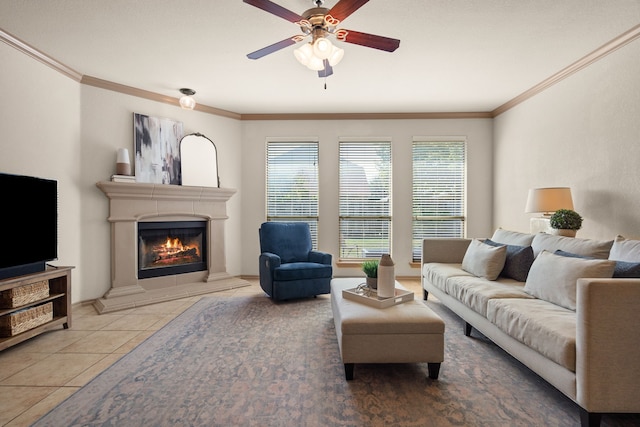 tiled living room with crown molding and ceiling fan