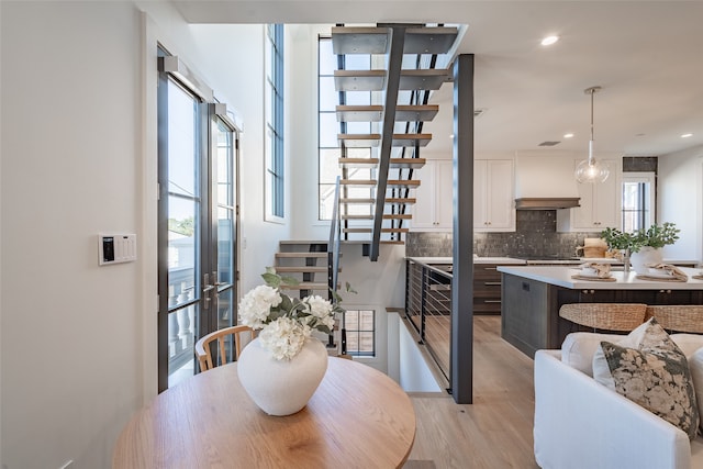 dining area with light hardwood / wood-style flooring