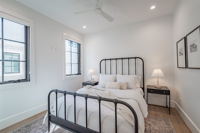 bedroom featuring ceiling fan and light wood-type flooring