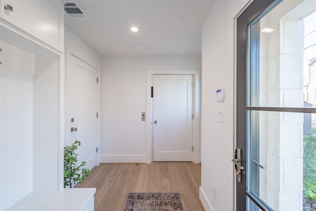 interior space with light hardwood / wood-style floors