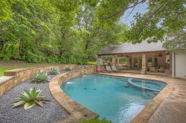 view of pool featuring ceiling fan, an outdoor hangout area, pool water feature, an in ground hot tub, and a patio area