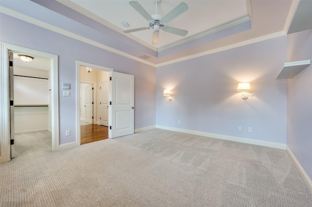 3025 Westminster Ave, University Park, TX 75205 - unfurnished bedroom featuring a tray ceiling, baseboards, ornamental molding, and carpet