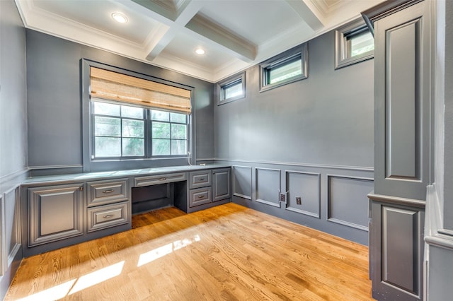 3025 Westminster Ave, University Park, TX 75205 - unfurnished office with light wood-style floors, a decorative wall, ornamental molding, built in desk, and beam ceiling
