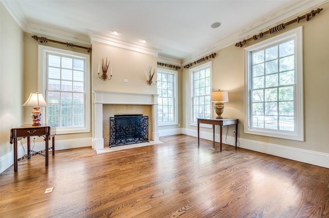 3025 Westminster Ave, University Park, TX 75205 - living area featuring a premium fireplace, crown molding, wood finished floors, and baseboards