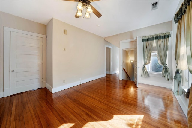 spare room with light hardwood / wood-style floors and ceiling fan