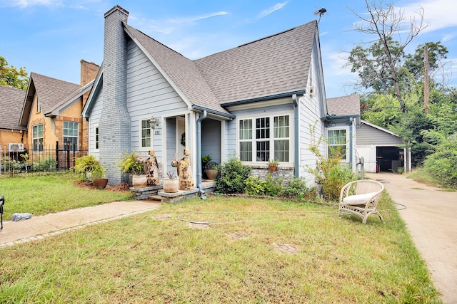 bungalow-style home with a front lawn and a carport