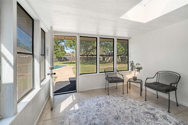 sunroom with a skylight