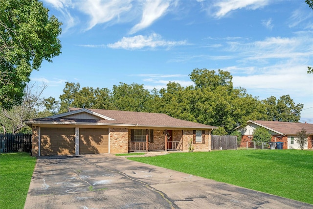 single story home with a front lawn and a garage