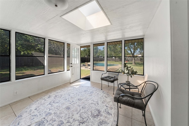 sunroom featuring a skylight